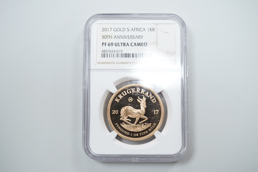 Gold coins, South Africa, 1oz. gold Krugerrand, 2017, NGC encapsulated and graded PF 69 ultra cameo, plastic case scratched